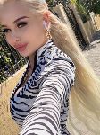 Russian Elina 34D bust size escort girl